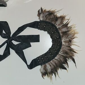 Anthropologie feather embellished lace tie necklace